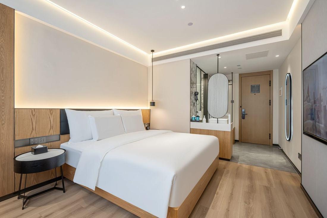 A bright modern double room at the City Joy Hotel in central Beijing