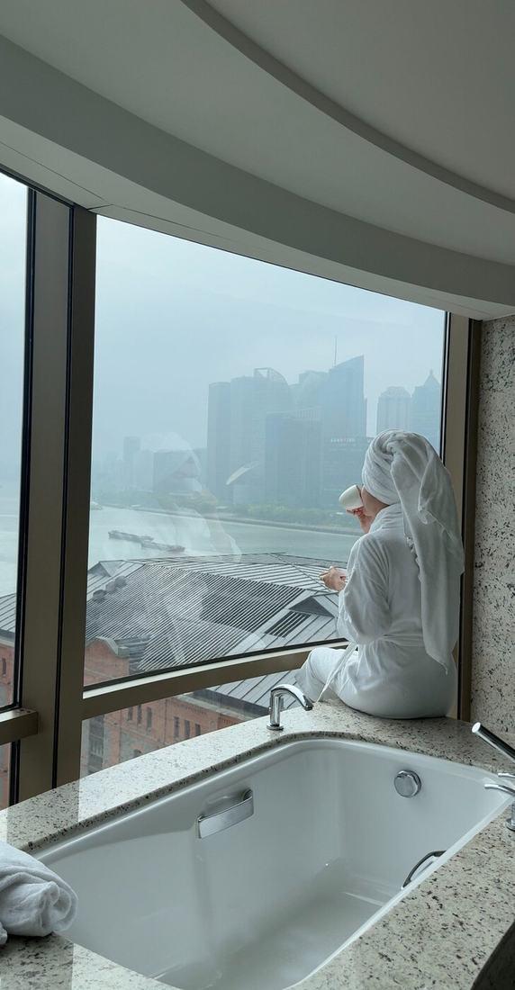 Looking out over the river from a Shanghai hotel room in the morning
