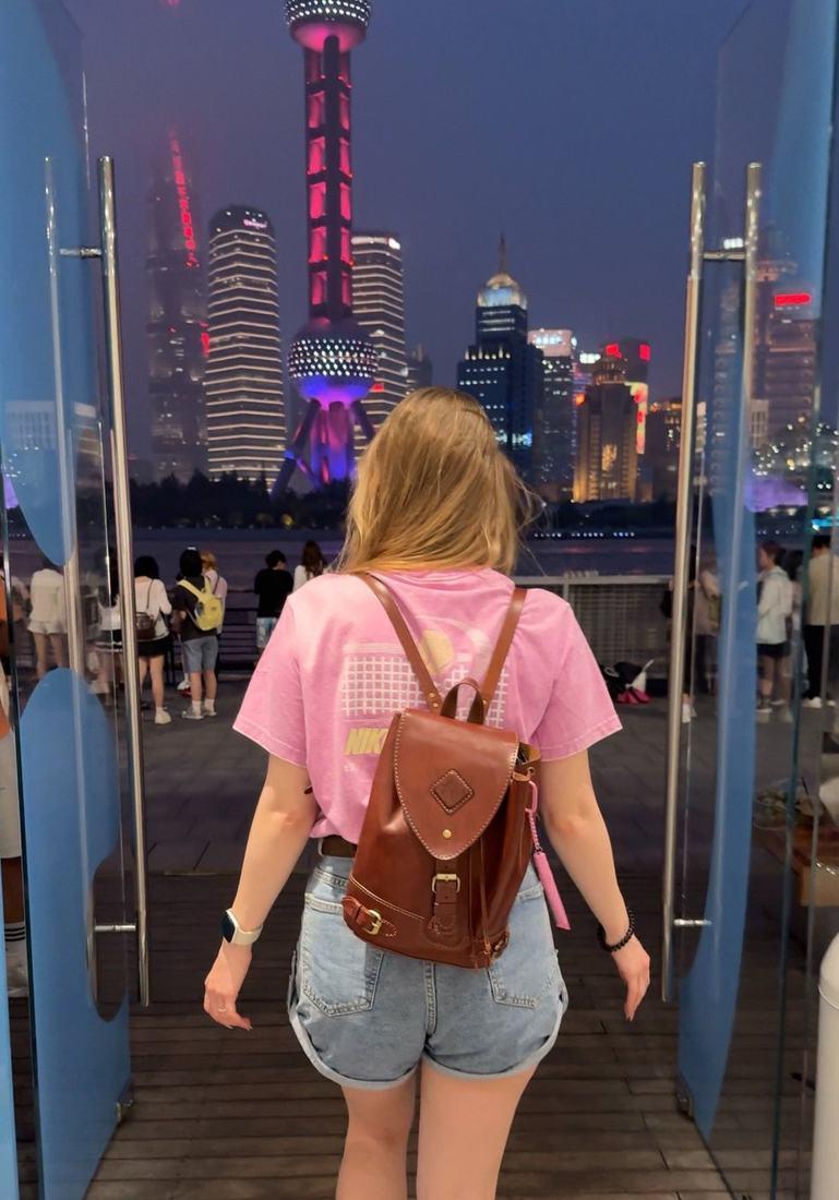 Stepping out of Manor Coffee onto the waterfront with the Pudong towers ahead
